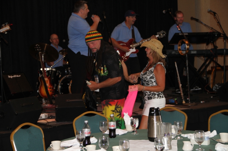 IMG_0273.JPG - Bill and Cindi selling raffle ticket and dancing