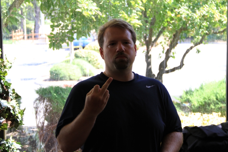 IMG_9556.JPG - Brad practicing his customer relations before opening merchandise