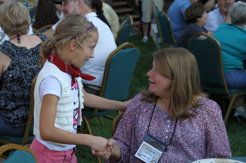 IMG_9649.JPG - Payton, one of Ride For Joy's students, introduced herself to every person at the reception, all 230 of them. She stole everyone's heart the entire week. 