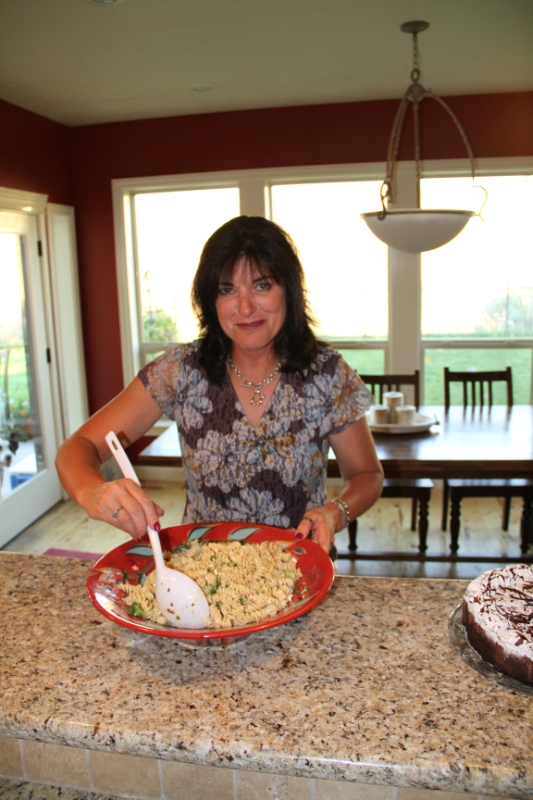 IMG_0908.JPG - When we passed back through Boise the folks from Ride Forjoy invited us up for dinner. Kenna's whipping up the pasta salad, which hasd some excellent spiciness. 