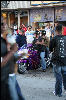 He seems so out of place on that bike