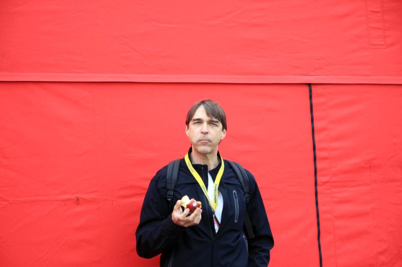 M09_1407.jpg - Nick eating the one healthy thing consumed this weekend
